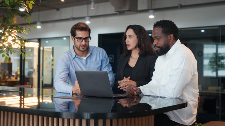 Professional team collaborating in a modern office